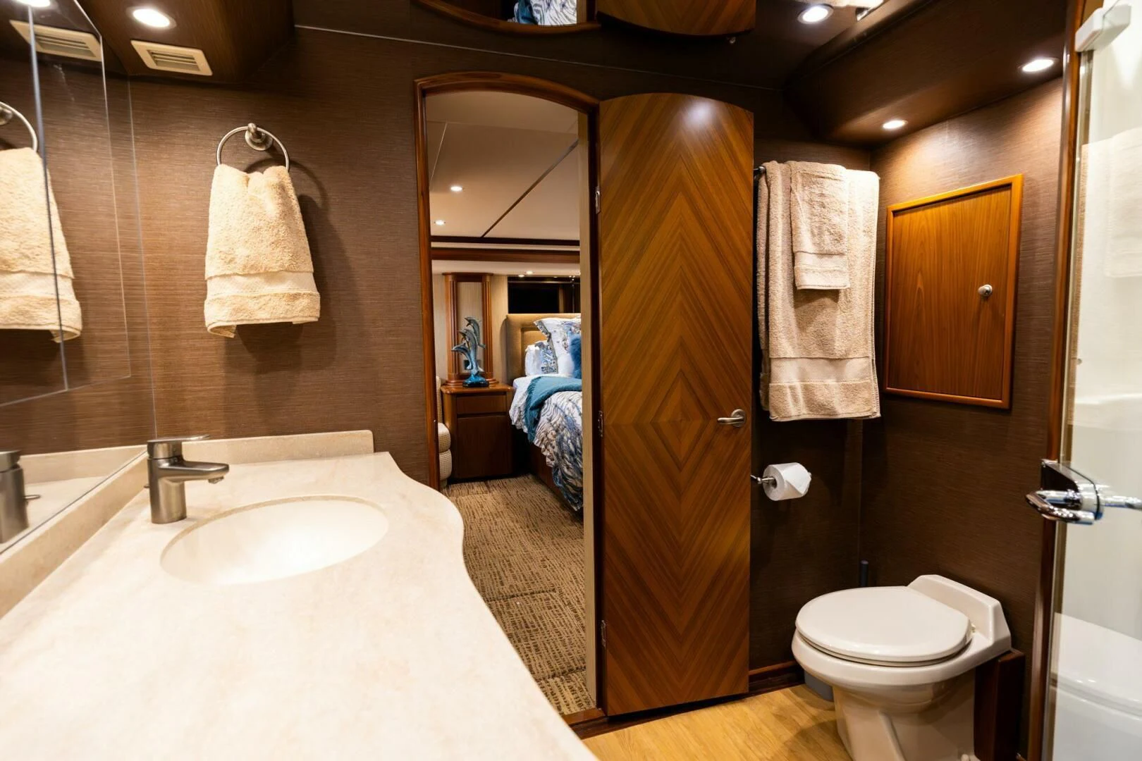 a bathroom with a bathtub and toilet aboard LITTLE AUDREY Yacht for Sale