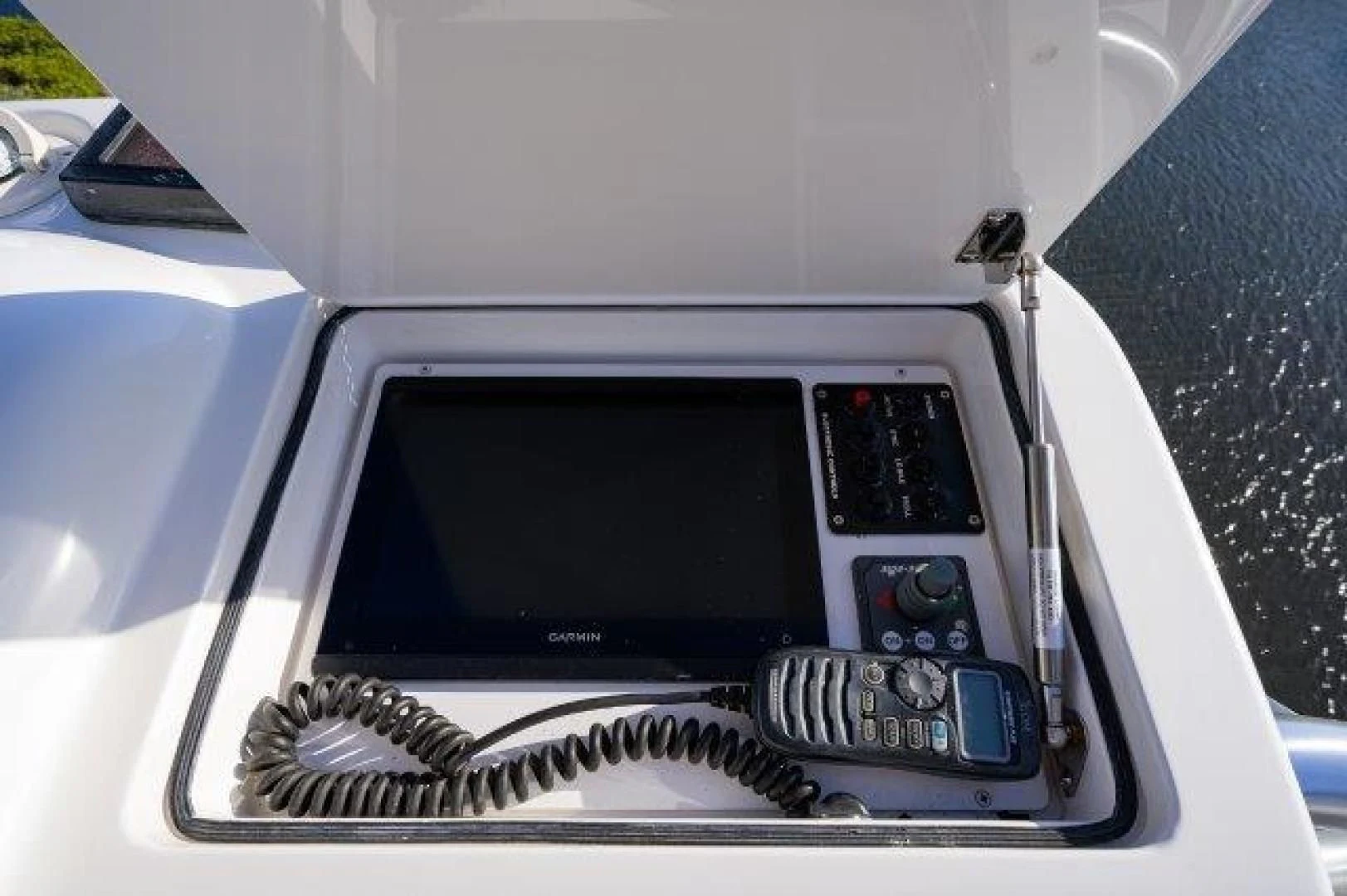 a car with a screen and buttons aboard LITTLE AUDREY Yacht for Sale