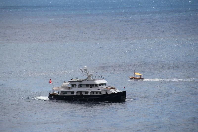 a boat sailing on the sea aboard IBI Yacht for Sale