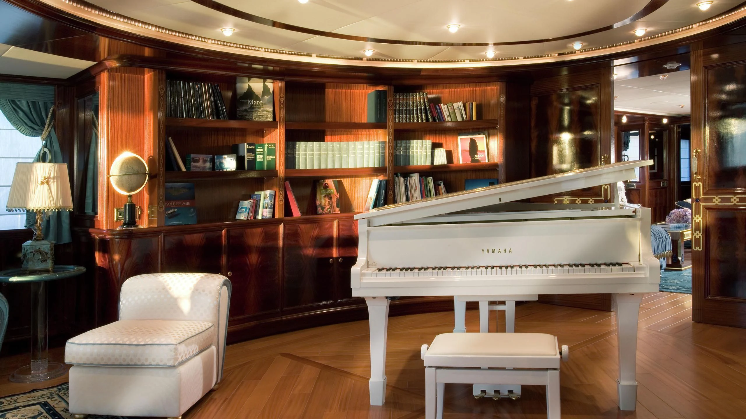a piano in a room aboard BEOL Yacht for Sale