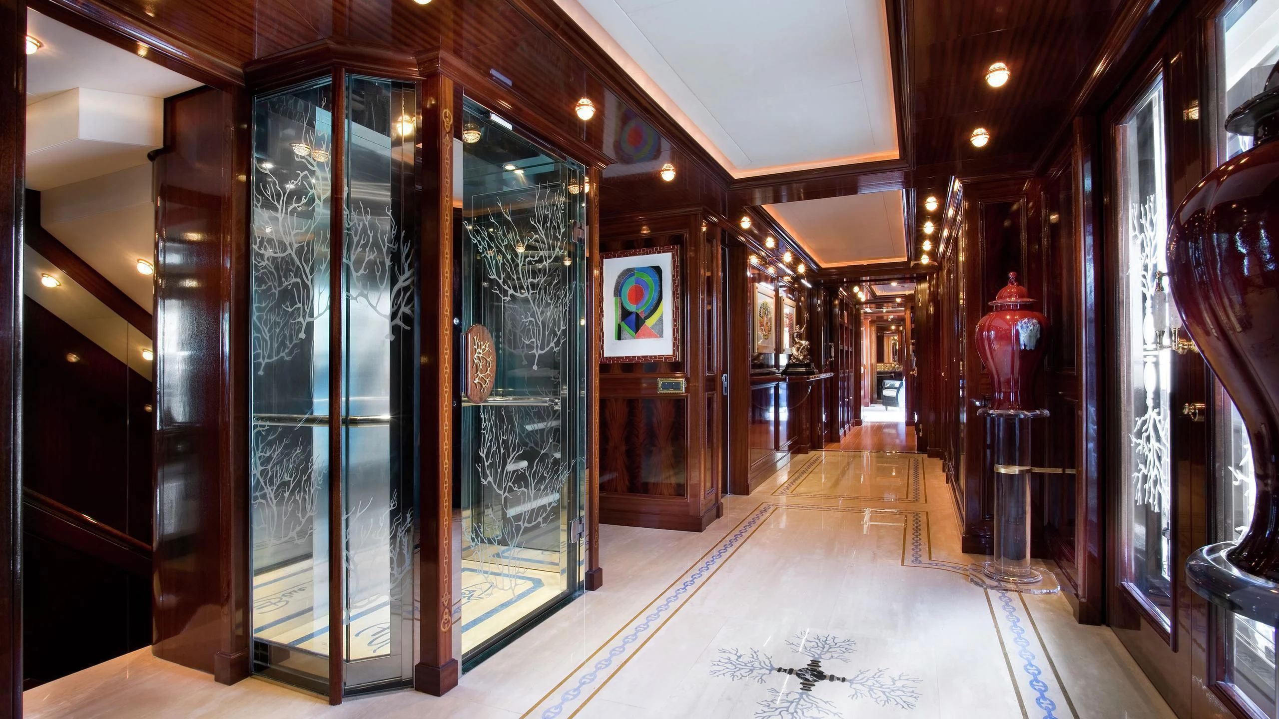 a room with glass doors aboard BEOL Yacht for Sale
