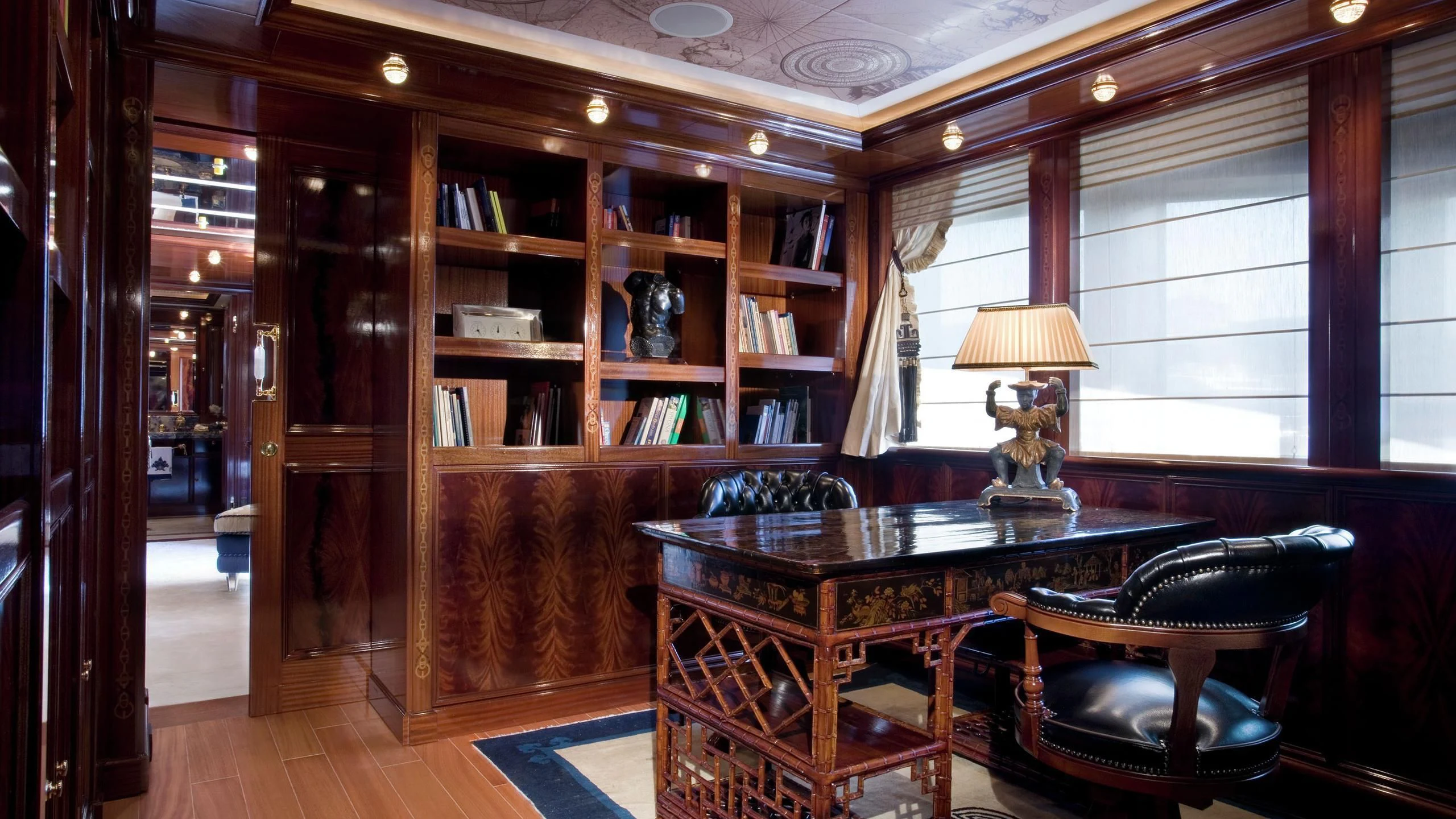 a room with a table and chairs aboard BEOL Yacht for Sale