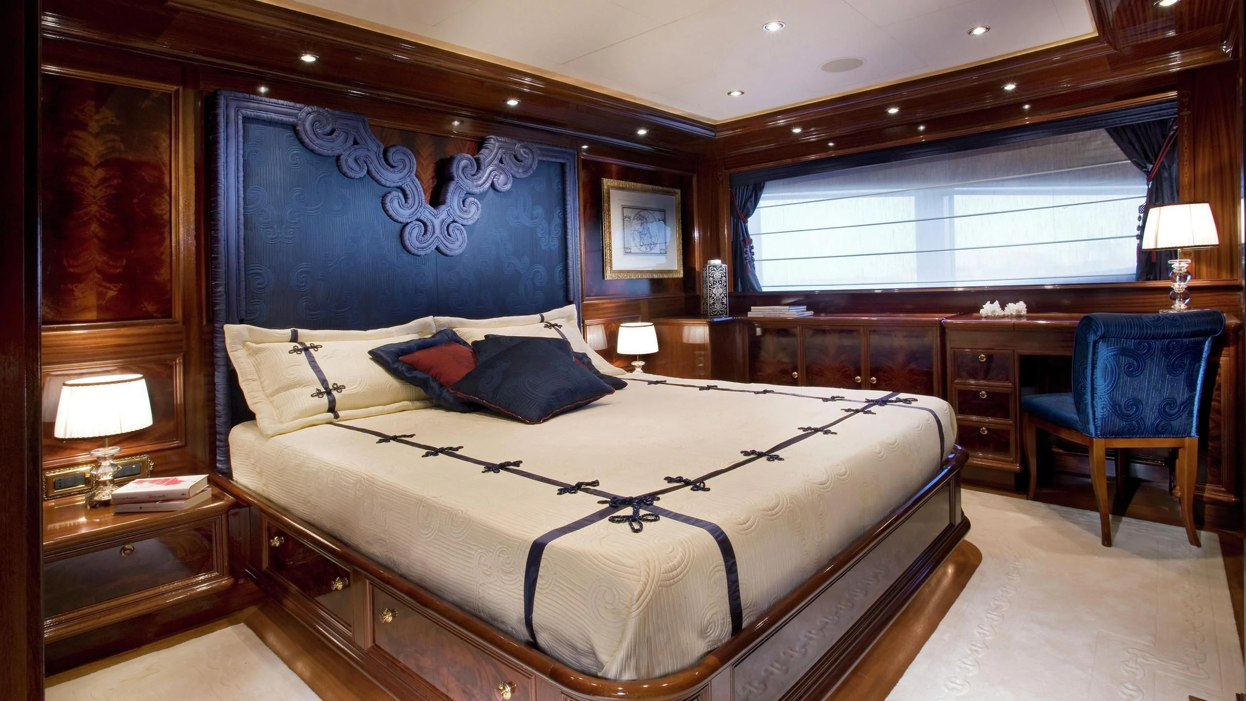 a large bedroom with a large bed aboard BEOL Yacht for Sale