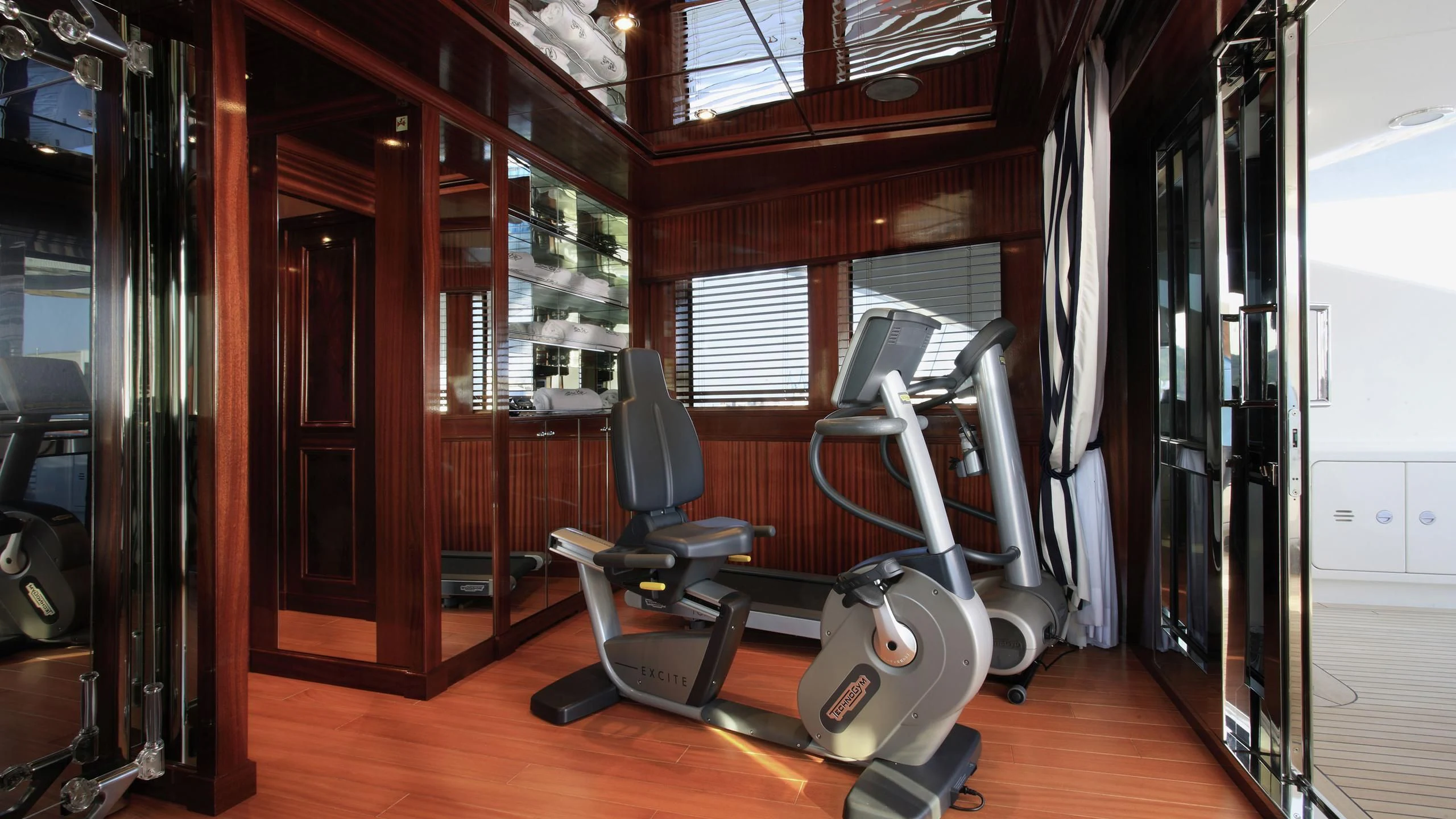 a gym with exercise equipment aboard BEOL Yacht for Sale
