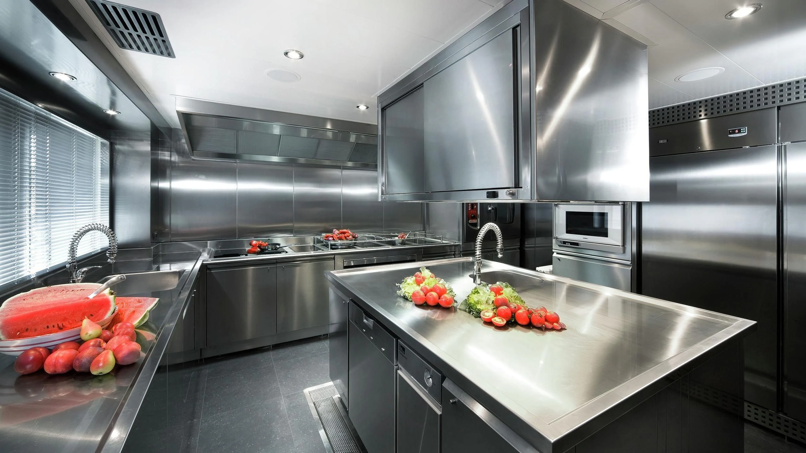 a kitchen with stainless steel appliances aboard BEOL Yacht for Sale