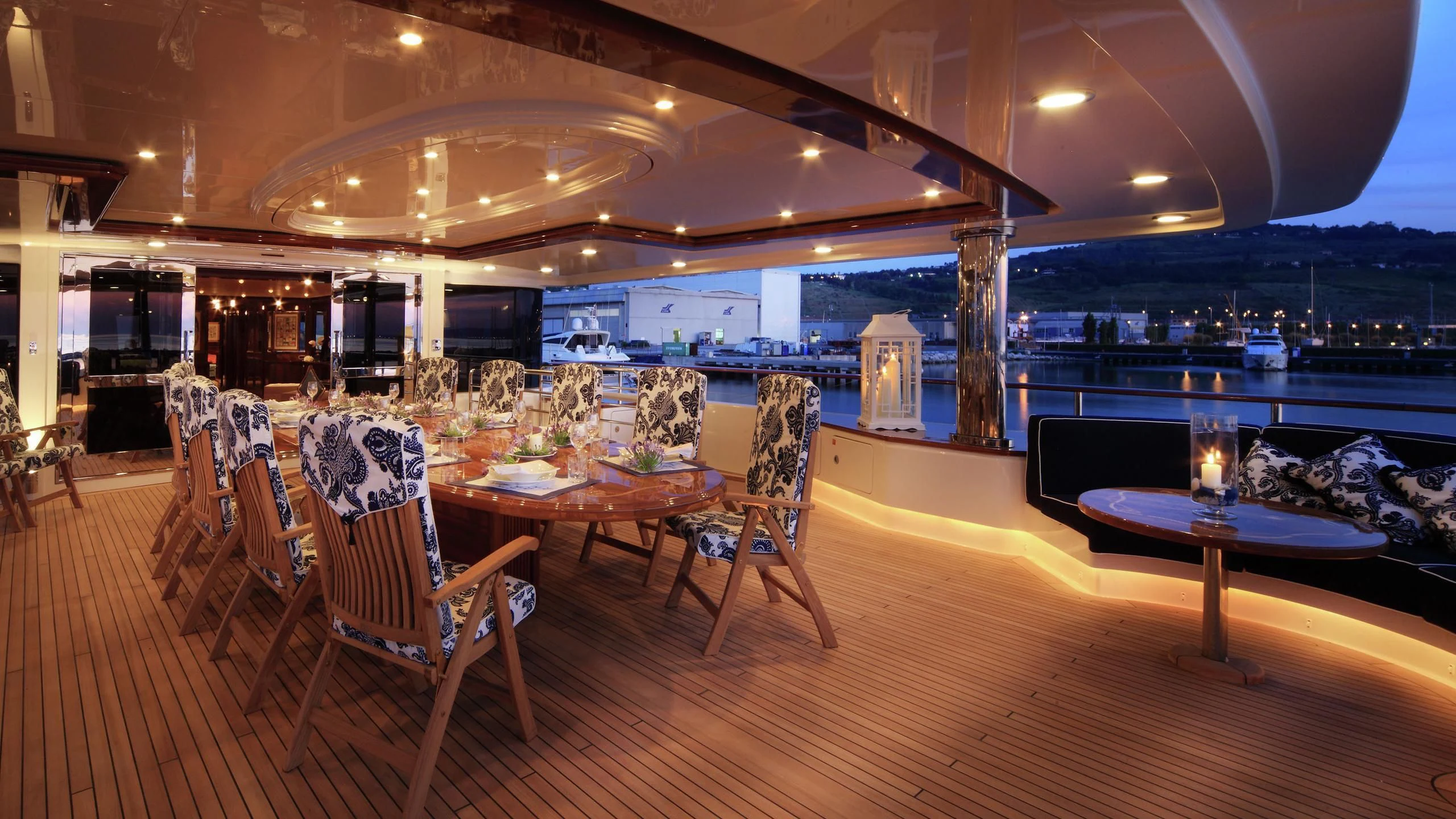 a room with tables and chairs aboard BEOL Yacht for Sale