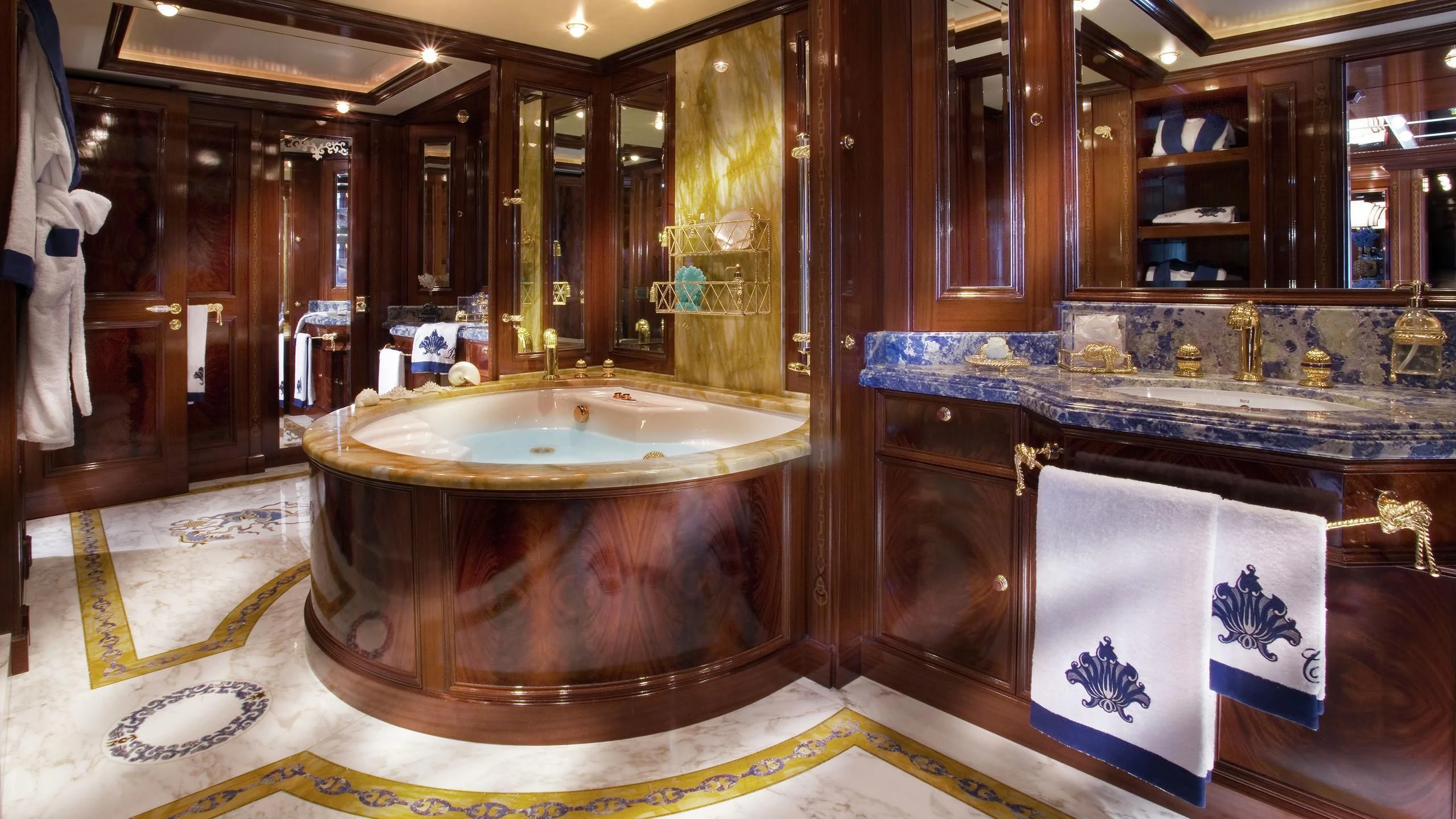 a bathroom with a large marble counter aboard BEOL Yacht for Sale