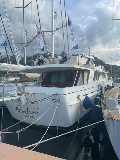a boat docked at a pier aboard CORDOVAL III Yacht for Sale