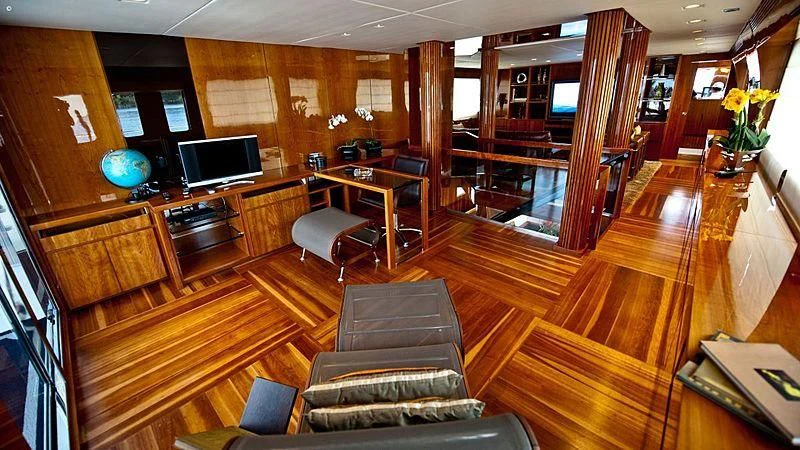 a living room with wood floors aboard ZENITH Yacht for Sale