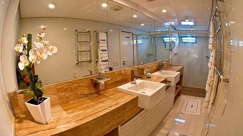 a bathroom with a large mirror aboard ZENITH Yacht for Sale