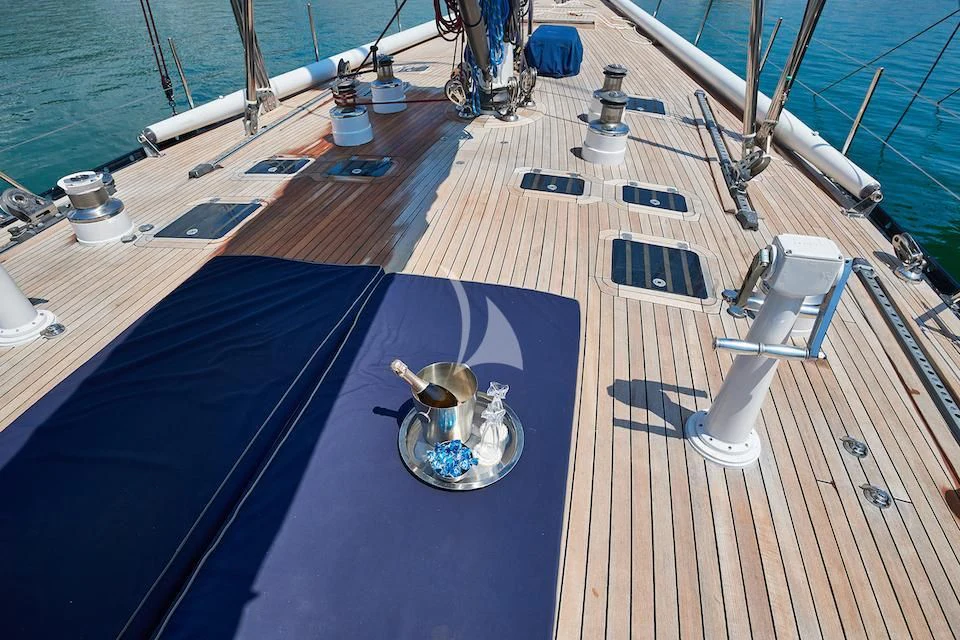 a table on a deck aboard DARK STAR OF LONDON Yacht for Charter