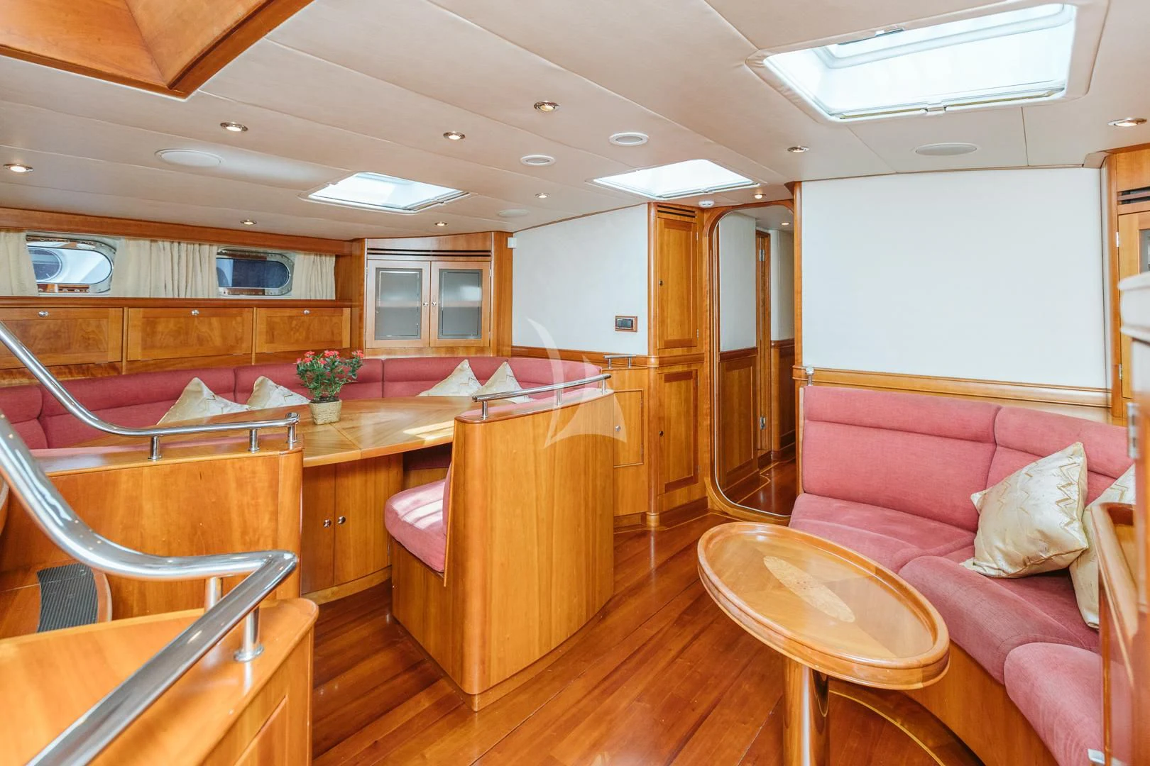 a room with a table and chairs aboard DARK STAR OF LONDON Yacht for Charter