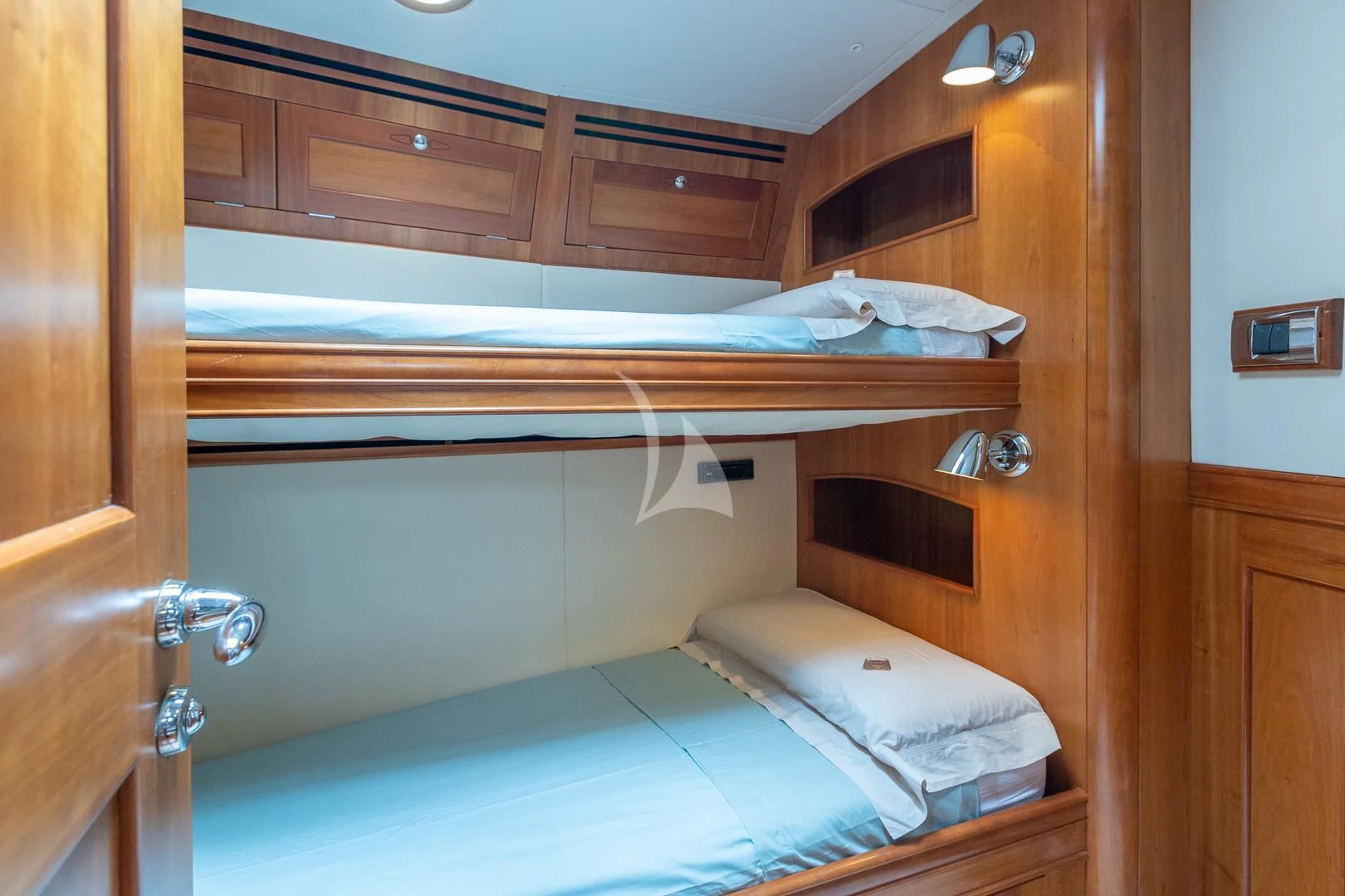 a couple of beds in a room aboard DARK STAR OF LONDON Yacht for Charter