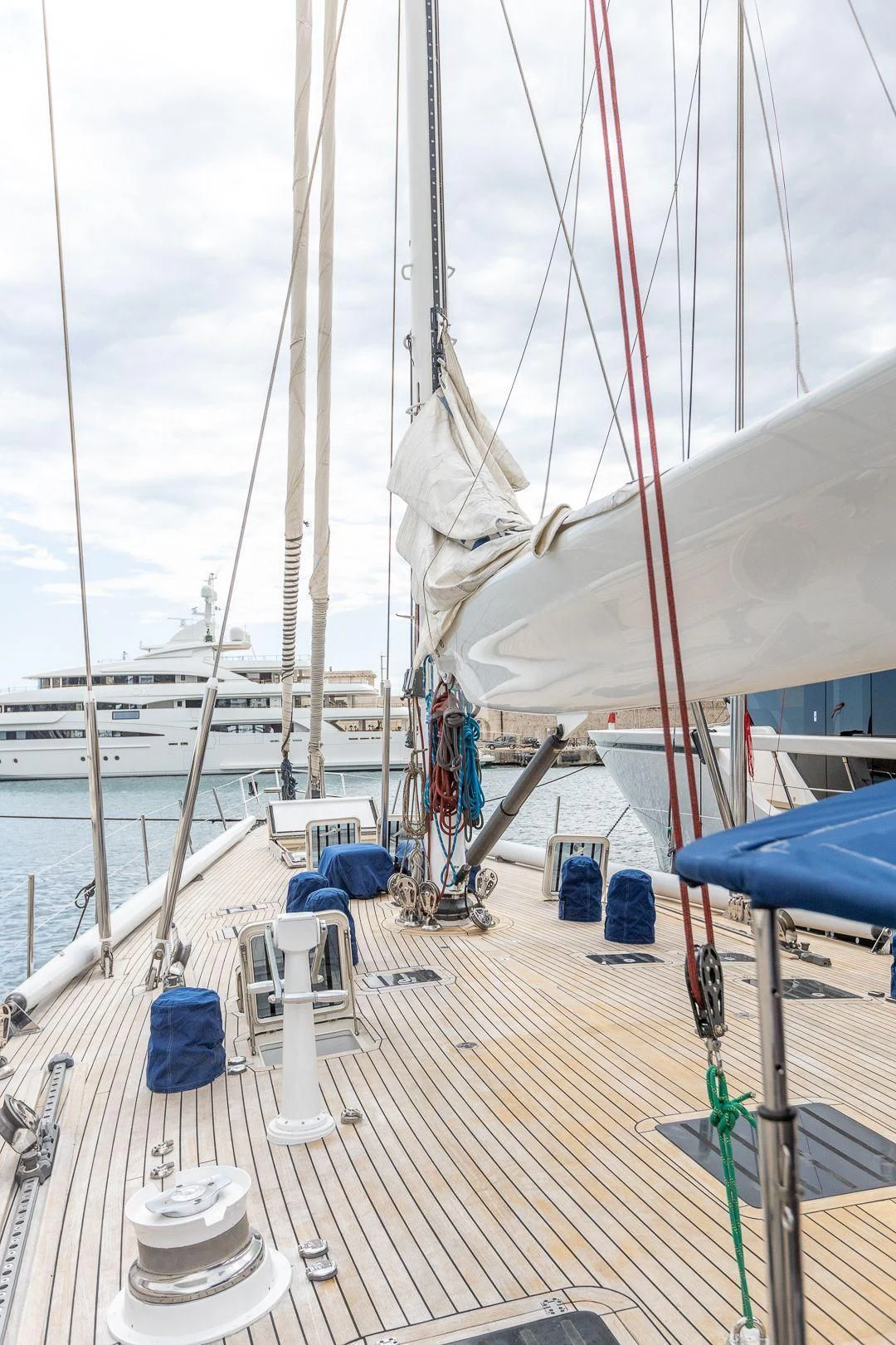 a boat docked at a pier aboard DARK STAR OF LONDON Yacht for Charter