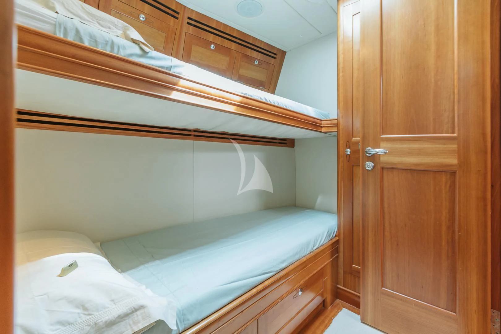 a room with two beds aboard DARK STAR OF LONDON Yacht for Charter