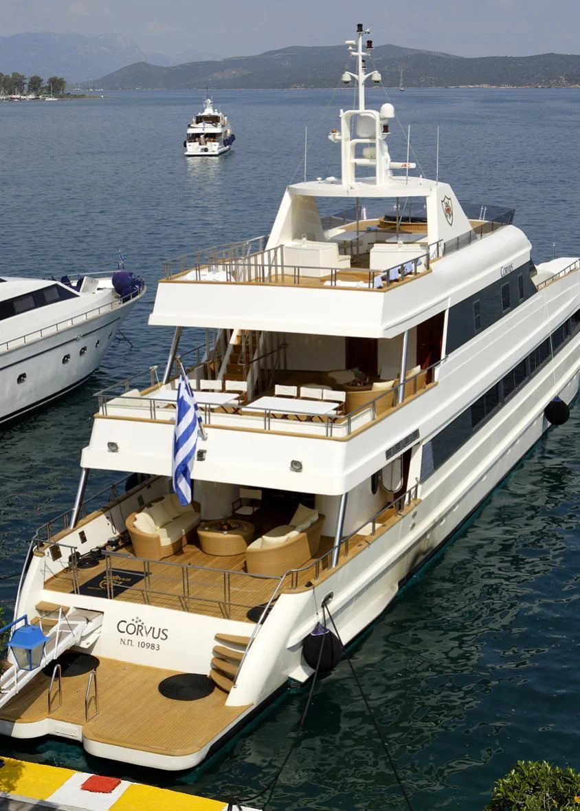 a large boat in the water aboard CORVUS Yacht for Sale