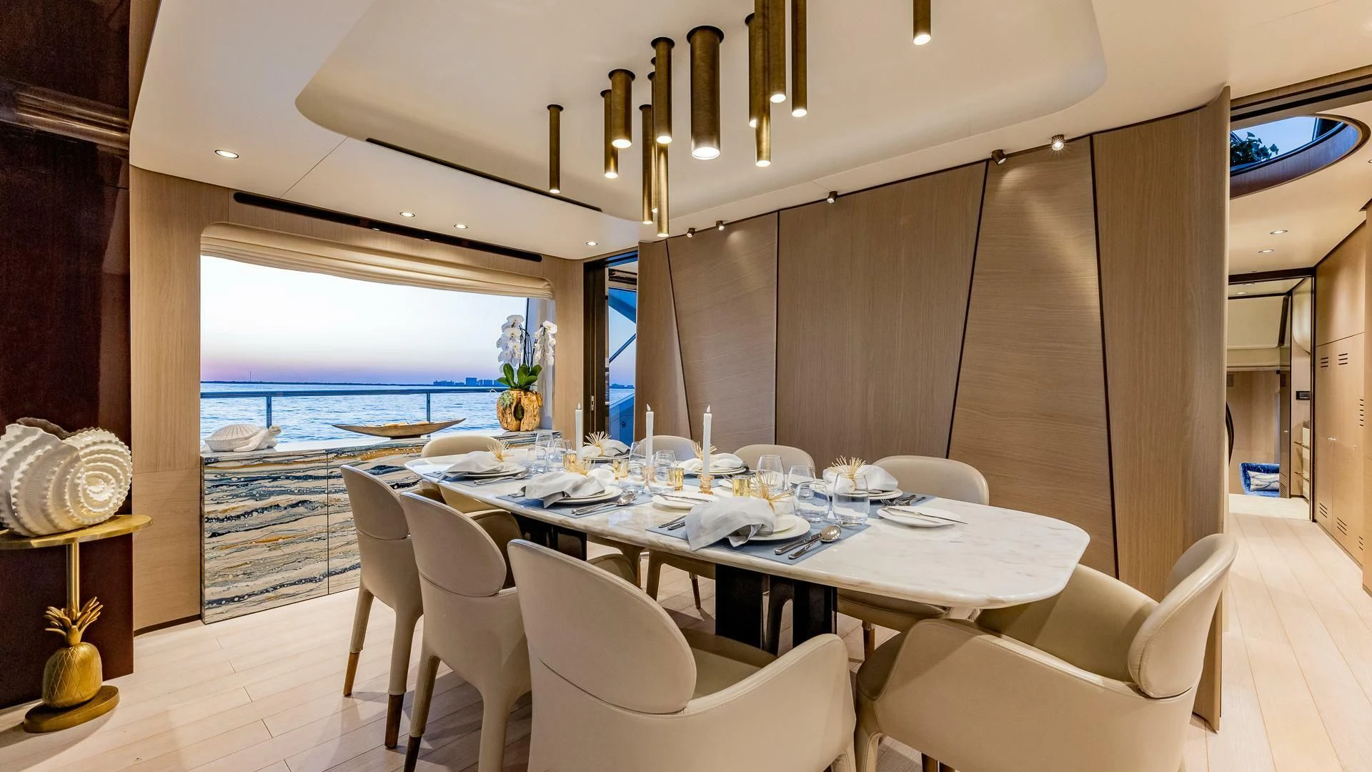 a dining table in a room aboard CAPTAIN MORGAN II Yacht for Sale