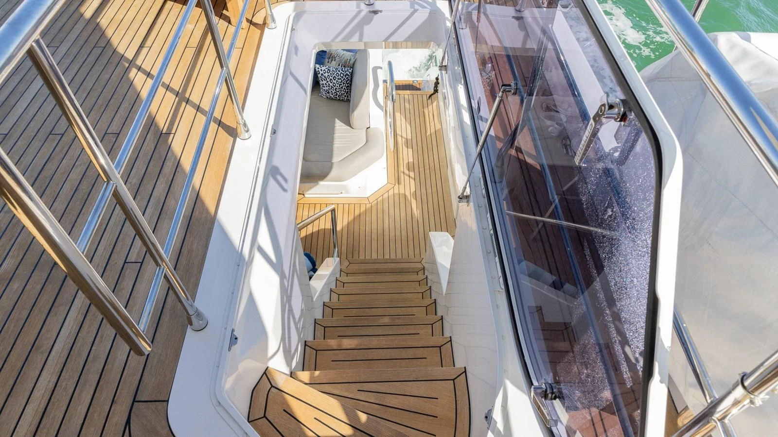 a set of stairs leading up to a balcony aboard CAPTAIN MORGAN II Yacht for Sale