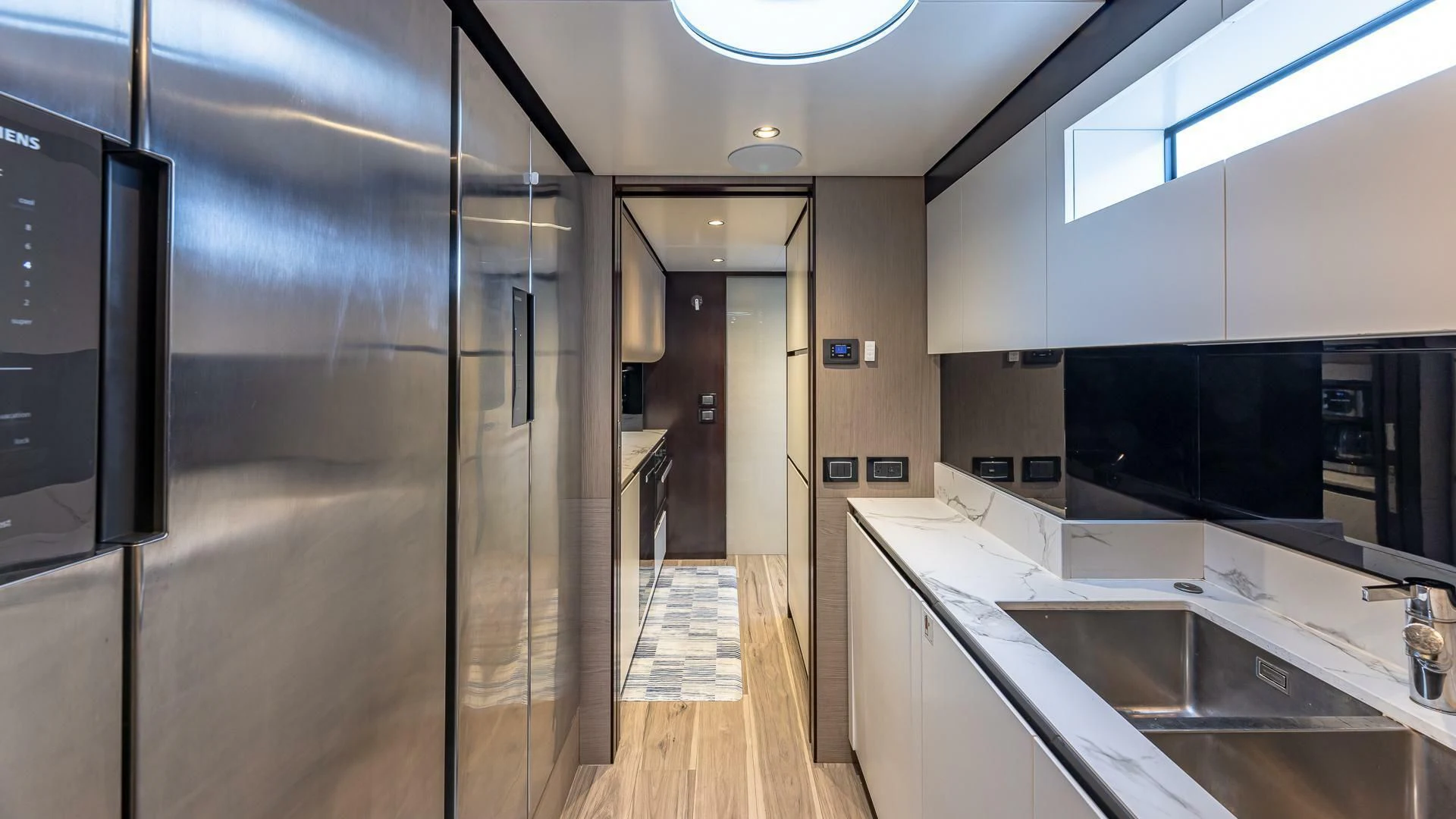 a kitchen with a large countertop aboard CAPTAIN MORGAN II Yacht for Sale