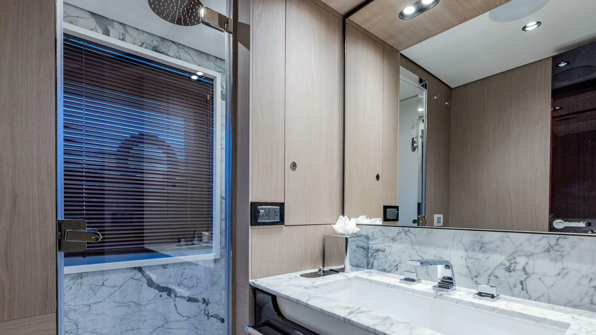 a bathroom with a large tub aboard CAPTAIN MORGAN II Yacht for Sale