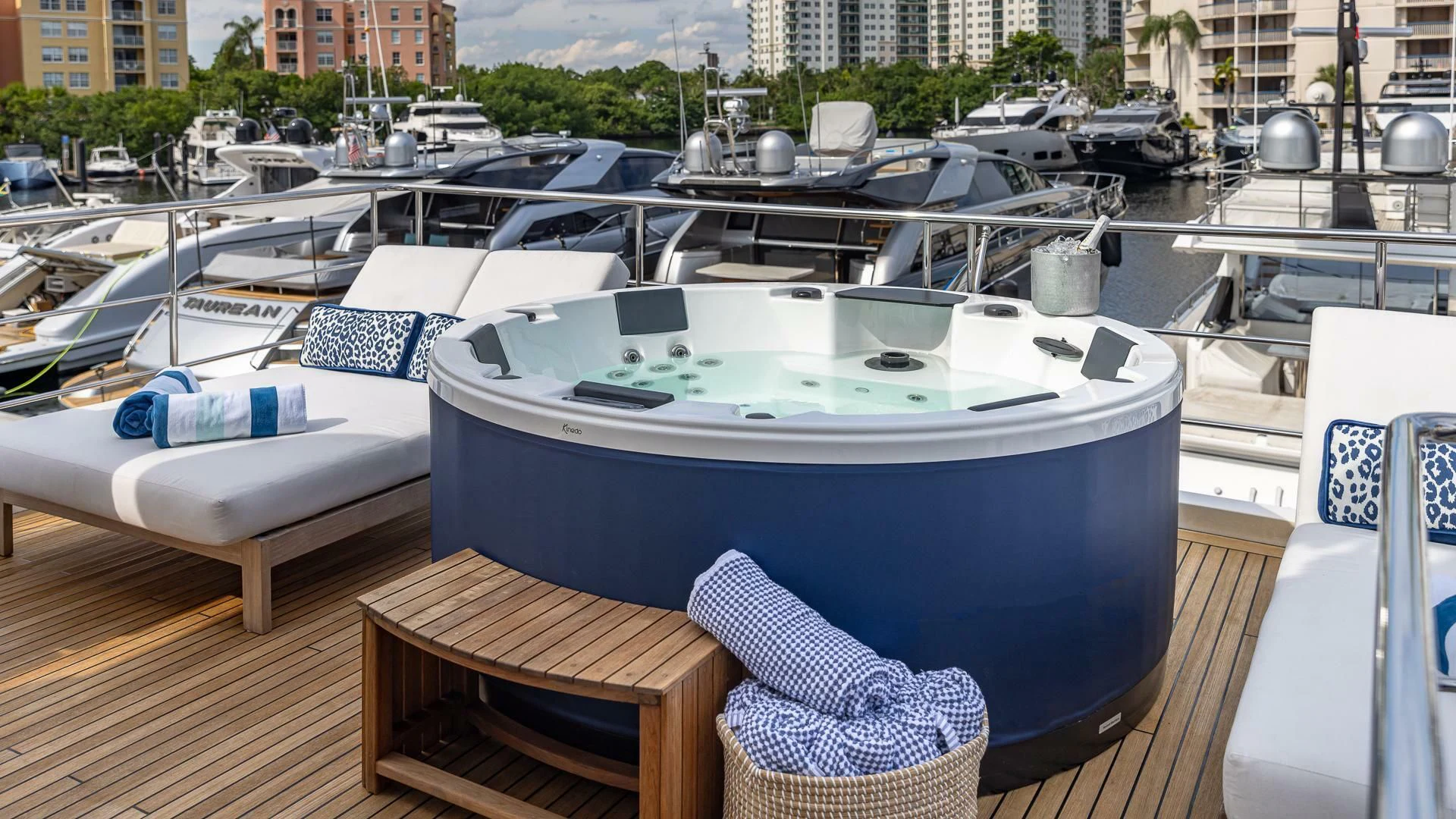 a table with chairs around it aboard CAPTAIN MORGAN II Yacht for Sale