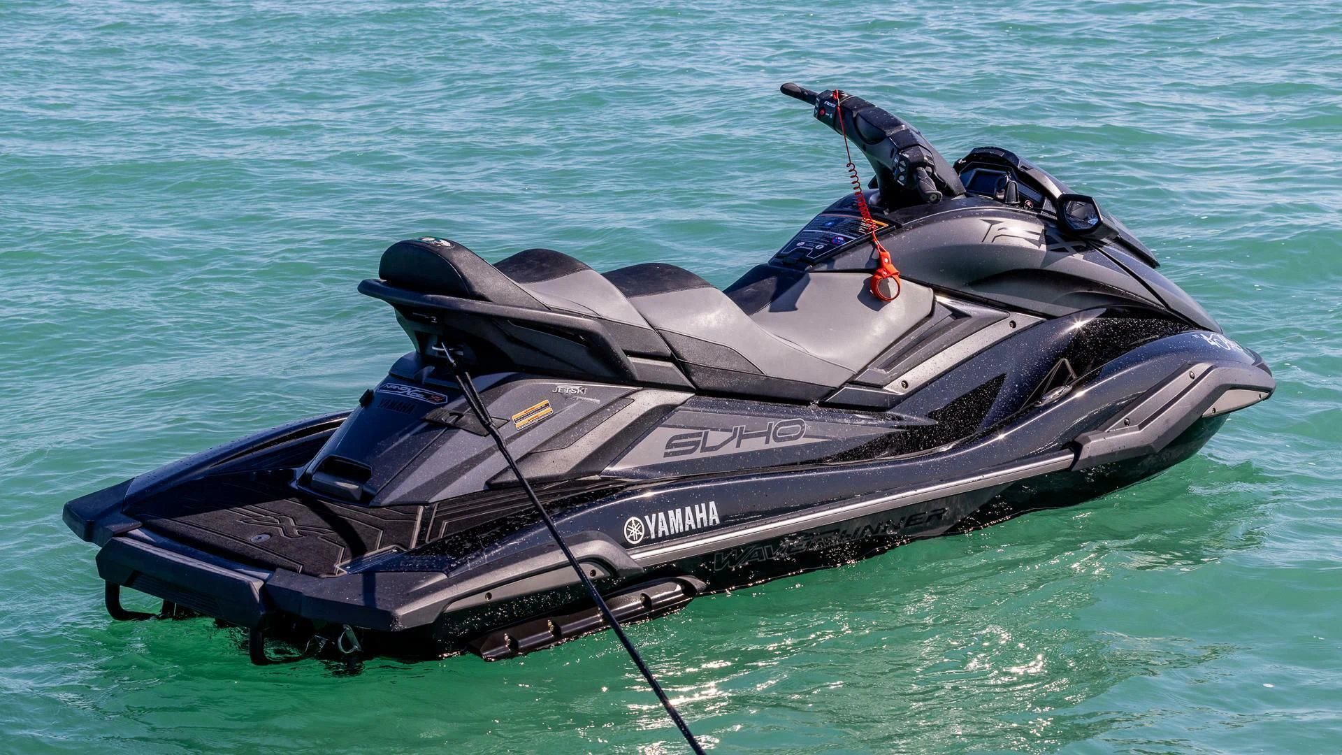 a black and silver boat on water aboard CAPTAIN MORGAN II Yacht for Sale