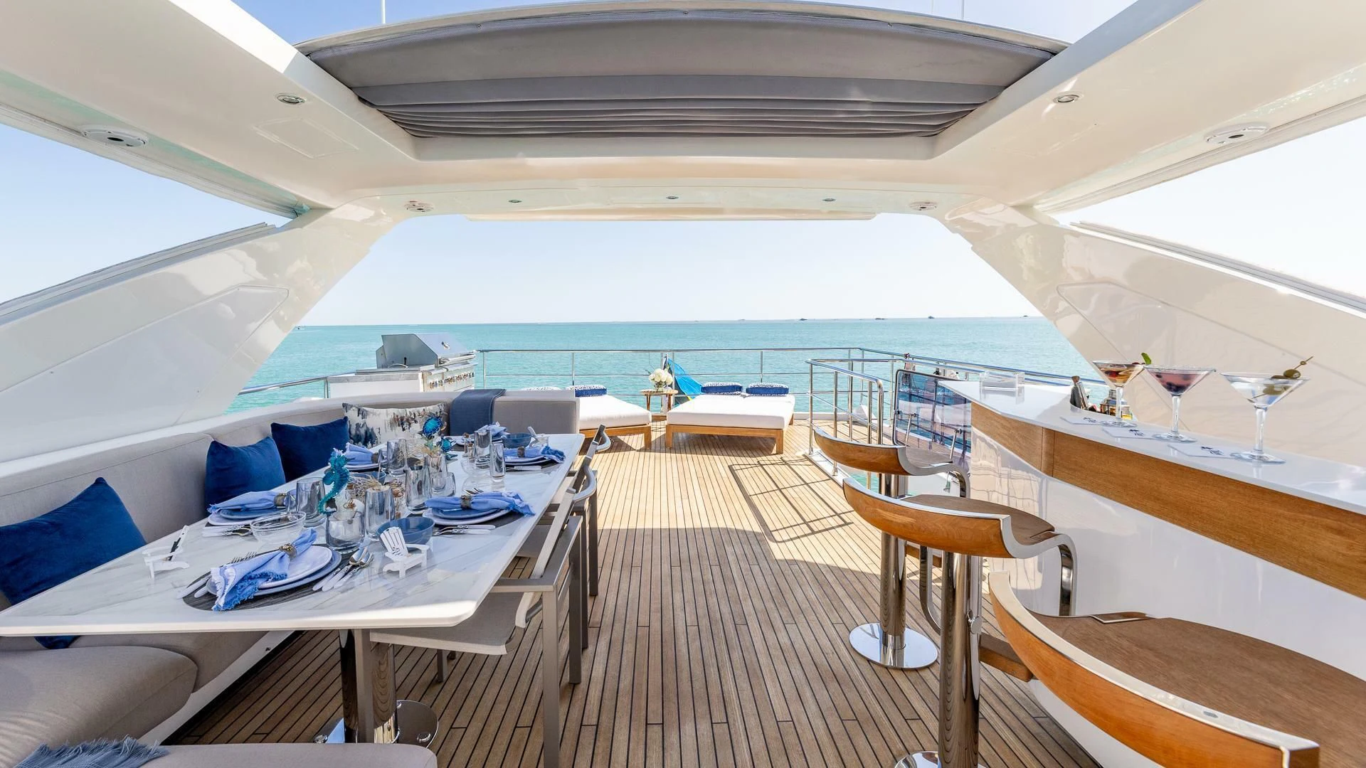 a boat with tables and chairs aboard CAPTAIN MORGAN II Yacht for Sale
