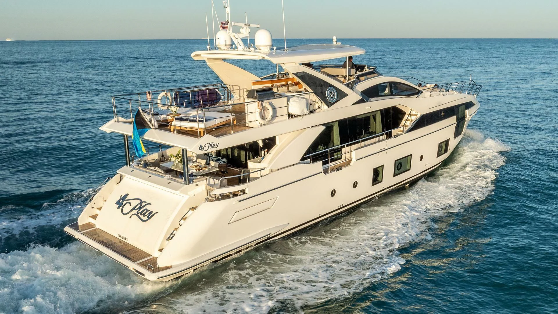 a large white boat in the water aboard CAPTAIN MORGAN II Yacht for Sale