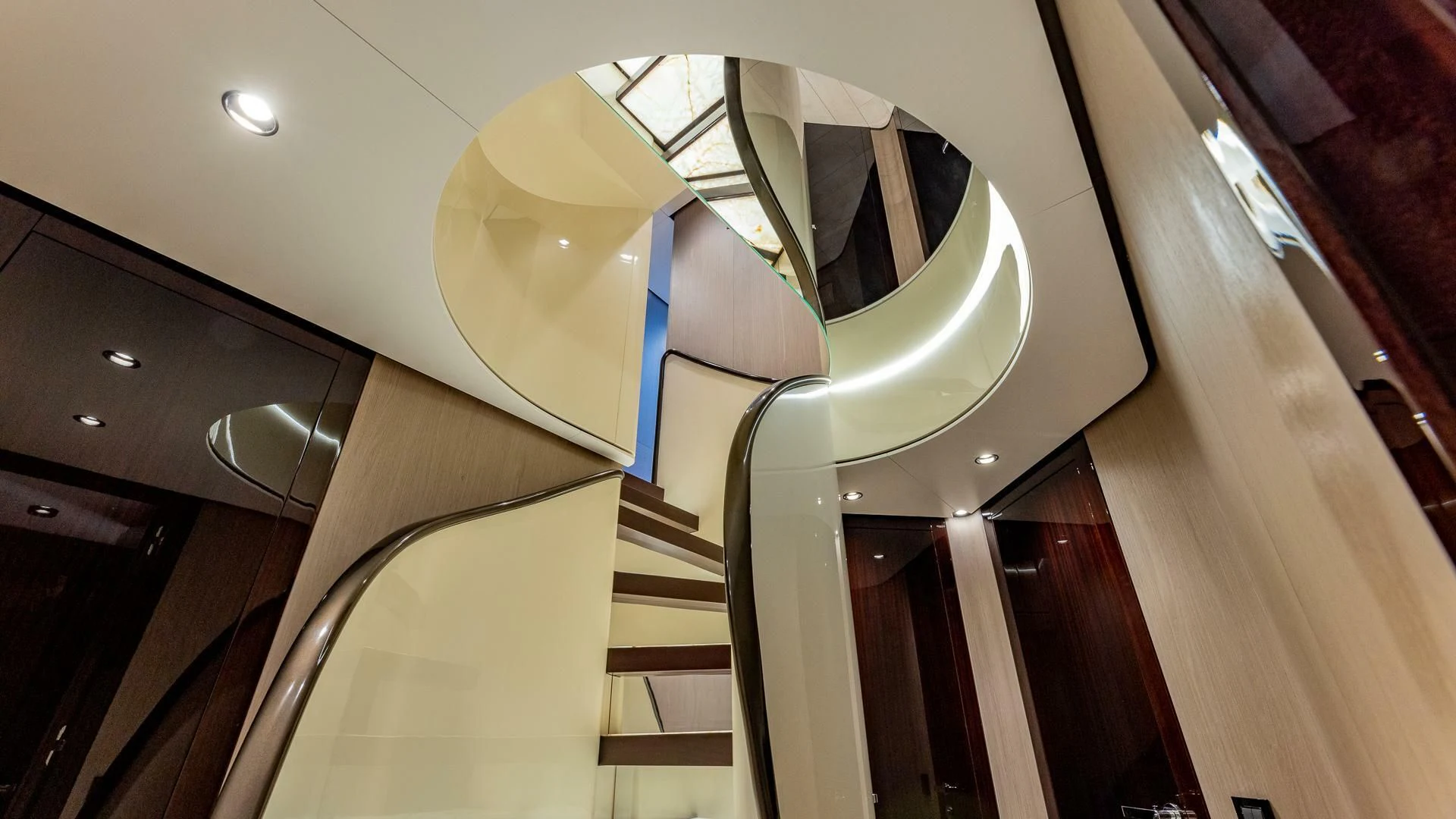 a staircase with a light aboard CAPTAIN MORGAN II Yacht for Sale