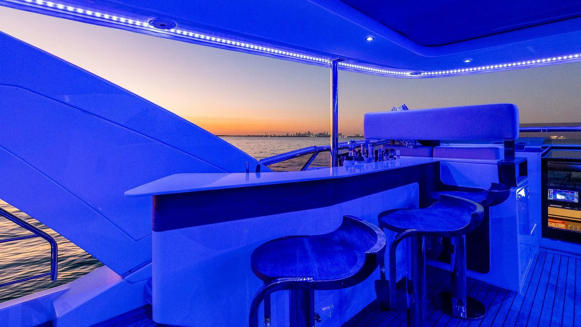 a room with a table and chairs aboard CAPTAIN MORGAN II Yacht for Sale