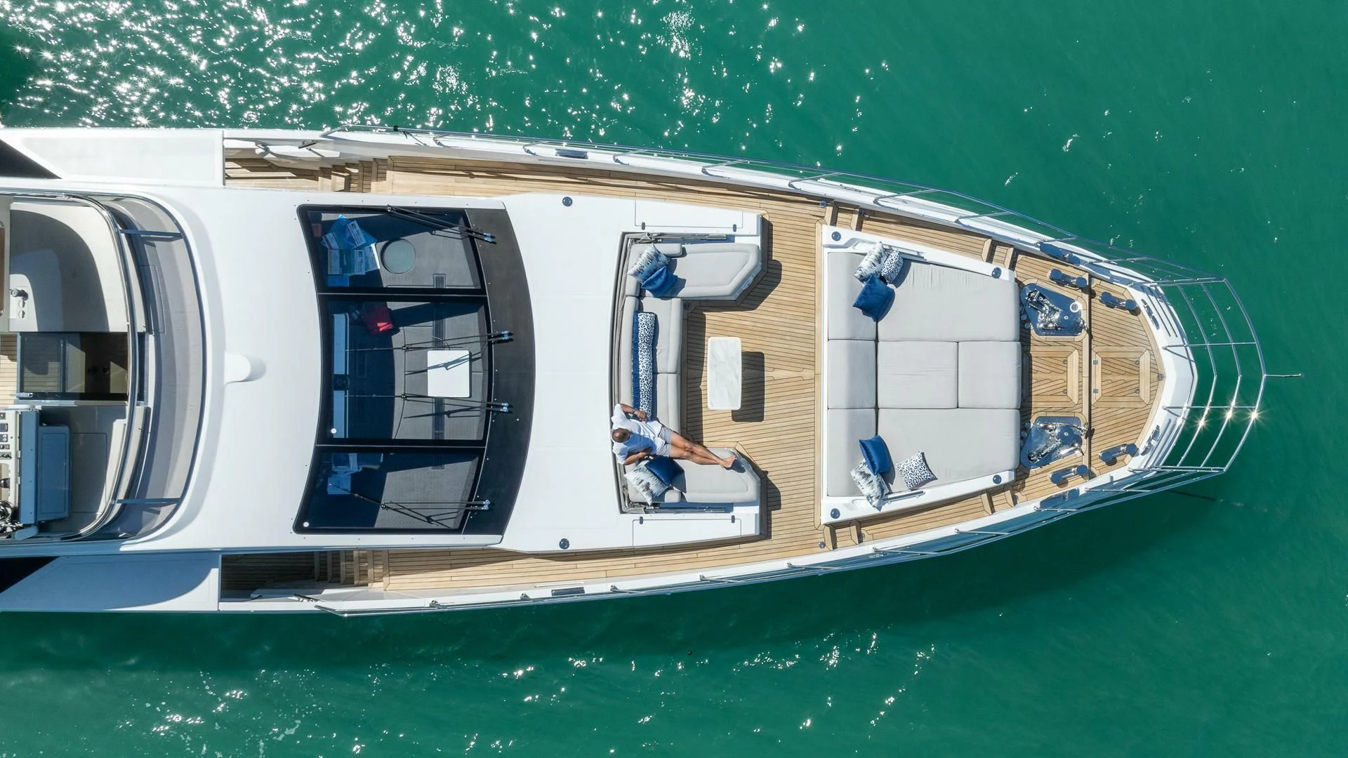a boat with a person on the deck aboard CAPTAIN MORGAN II Yacht for Sale