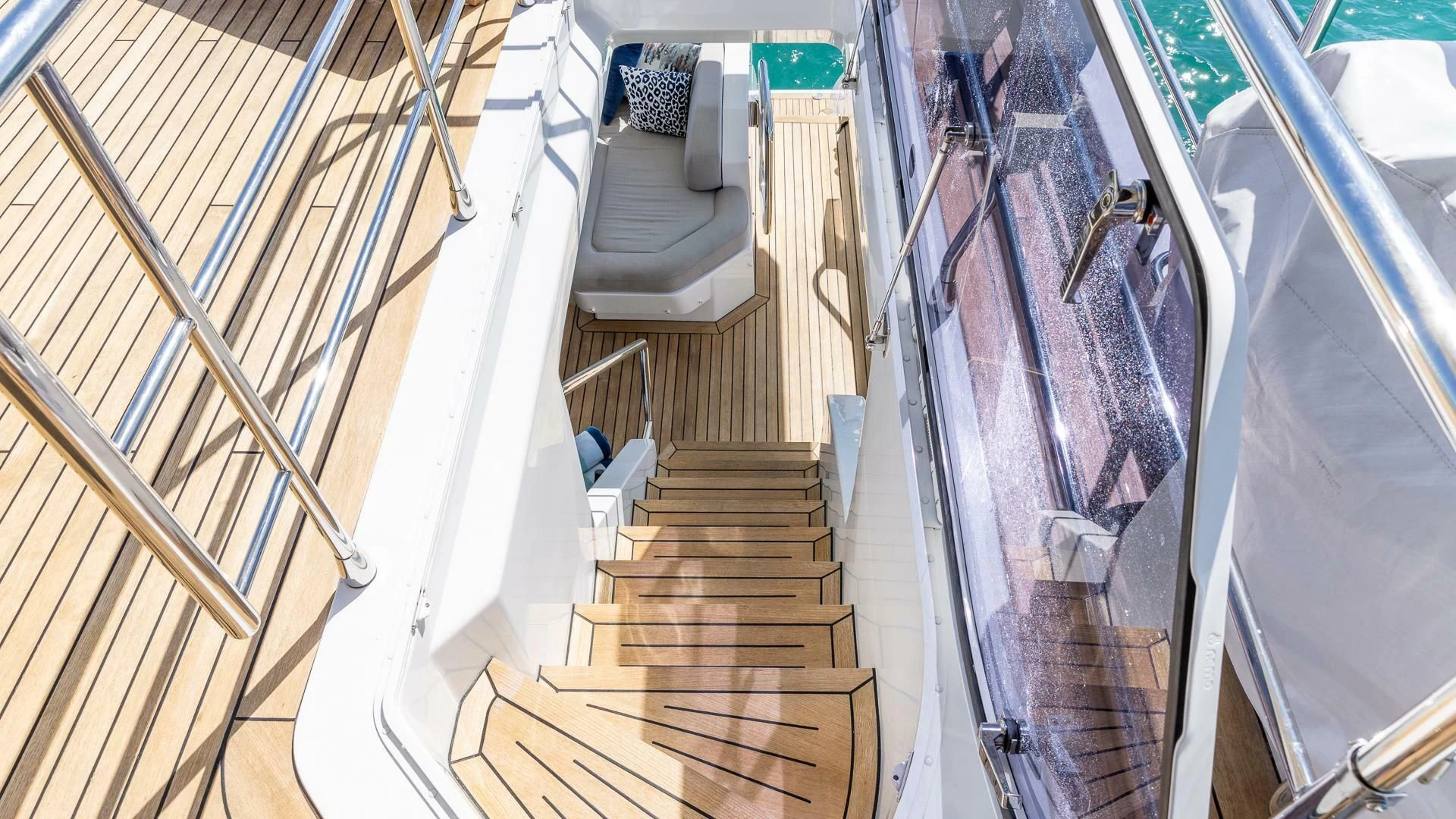 a person walking up a flight of stairs aboard CAPTAIN MORGAN II Yacht for Sale