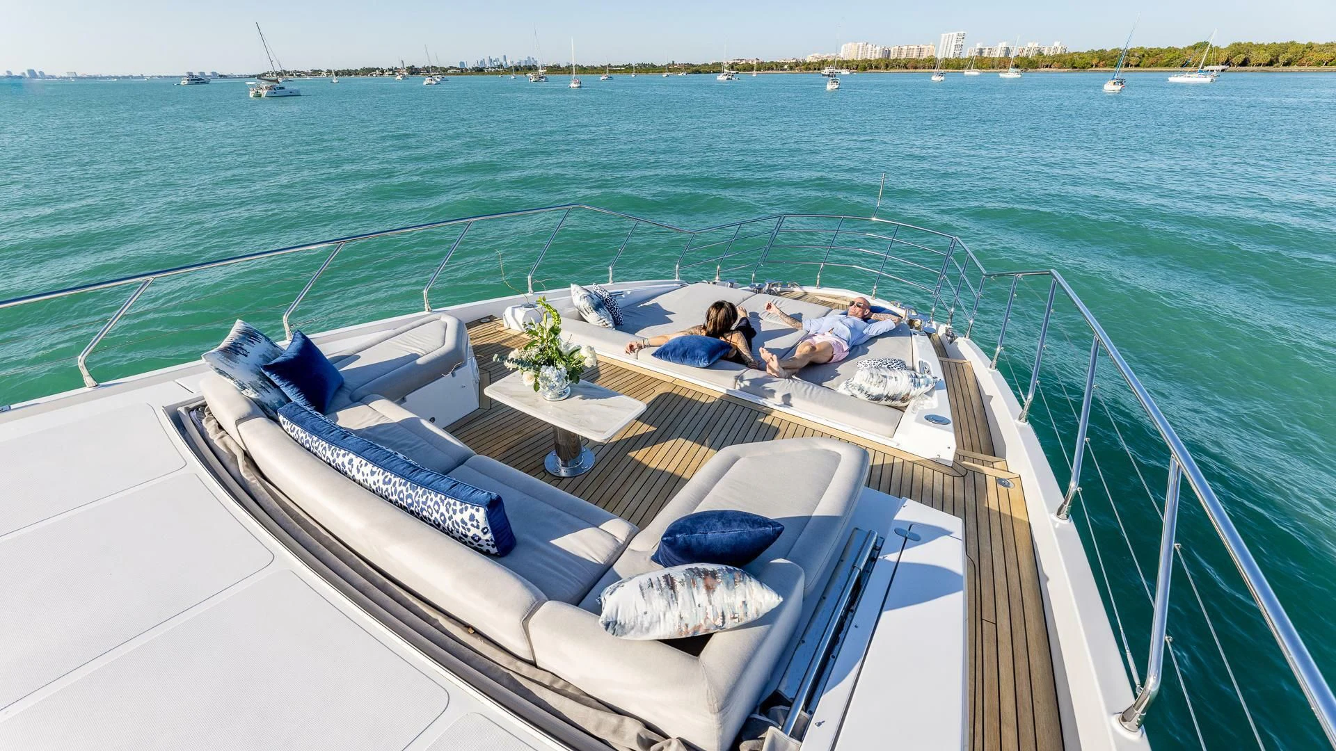 a man and woman on a boat aboard CAPTAIN MORGAN II Yacht for Sale