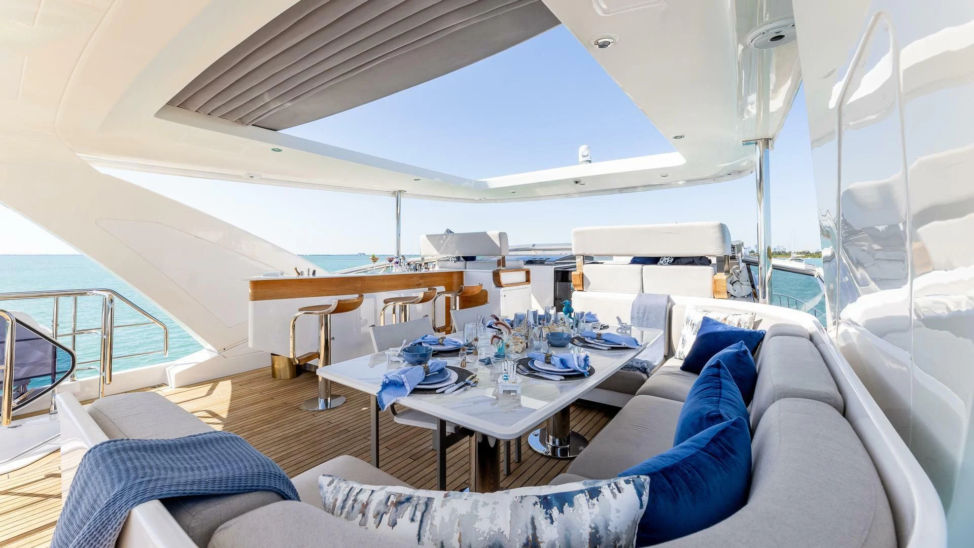 a tent with a table and chairs aboard CAPTAIN MORGAN II Yacht for Sale