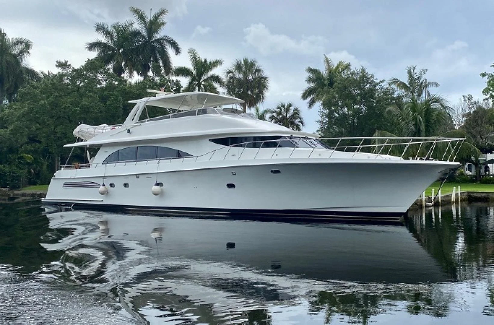 a white yacht in a body of water aboard SELF MADE Yacht for Sale