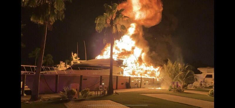 a building on fire aboard SELF MADE Yacht for Sale