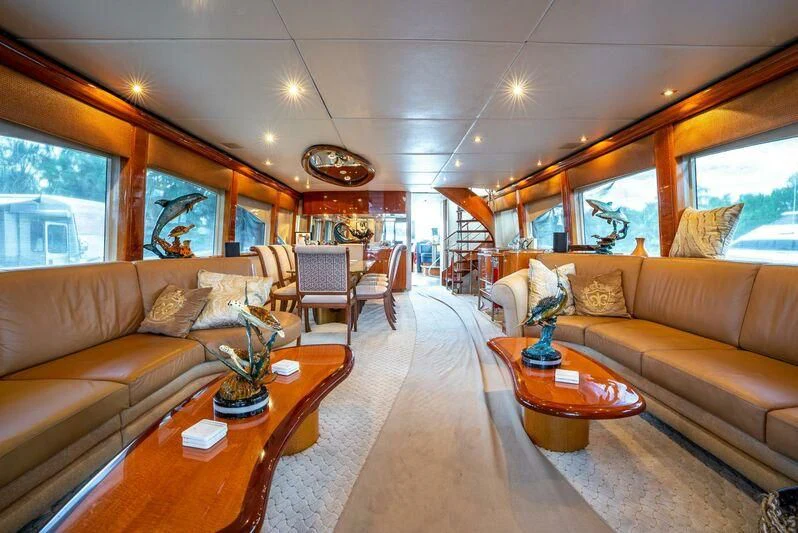 a living room with a couch and a coffee table aboard SELF MADE Yacht for Sale