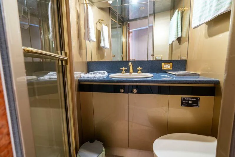 a bathroom with a sink and a toilet aboard SELF MADE Yacht for Sale