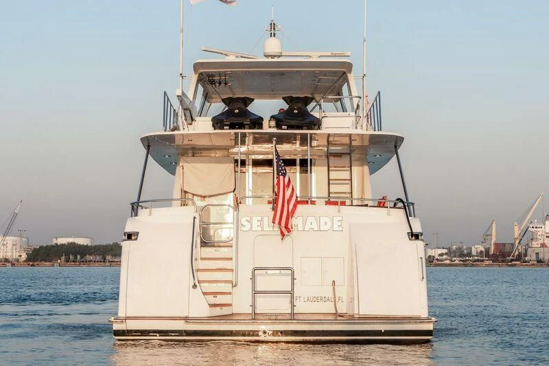 a large ship in the water aboard SELF MADE Yacht for Sale