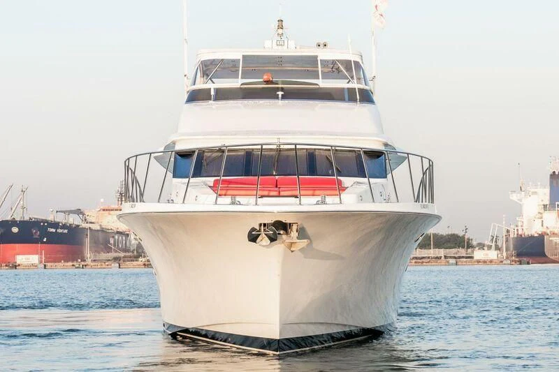 a white boat in the water aboard SELF MADE Yacht for Sale