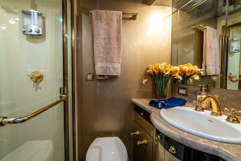 a bathroom with a sink and toilet aboard SELF MADE Yacht for Sale
