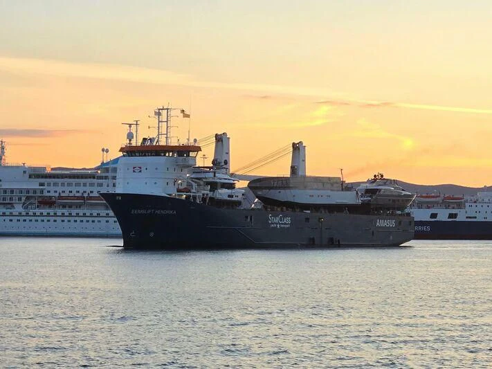 a large ship in the water aboard NERTILA Yacht for Sale