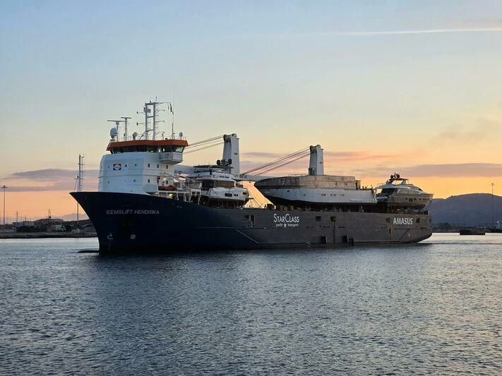 a large ship in the water aboard NERTILA Yacht for Sale