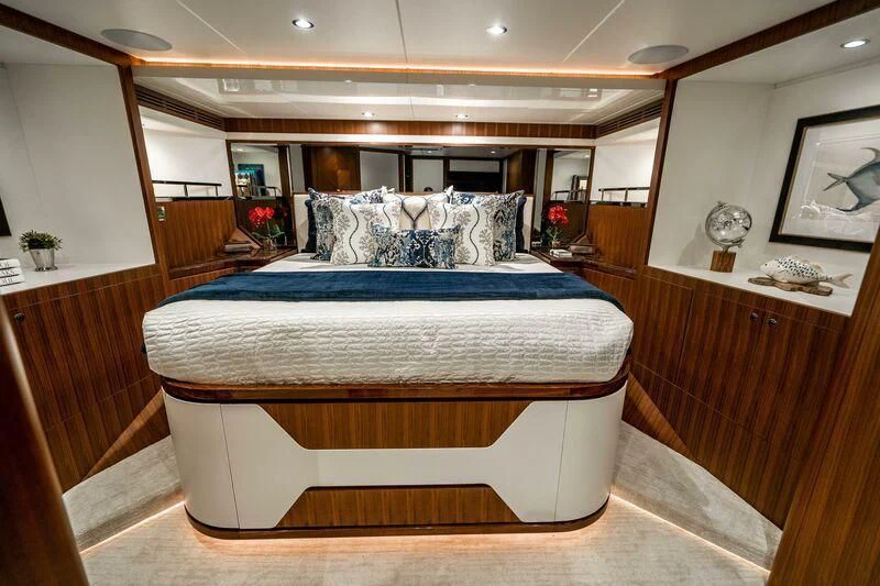 a bed in a room aboard AURA Yacht for Sale