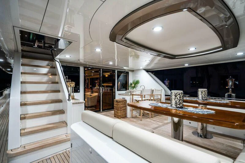 a large room with a large glass display case aboard AURA Yacht for Sale