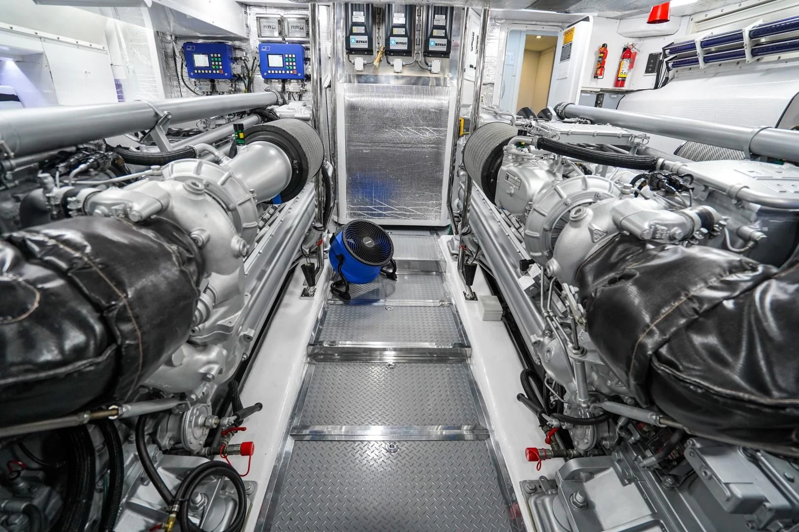 a close-up of a car engine aboard AMORA Yacht for Sale