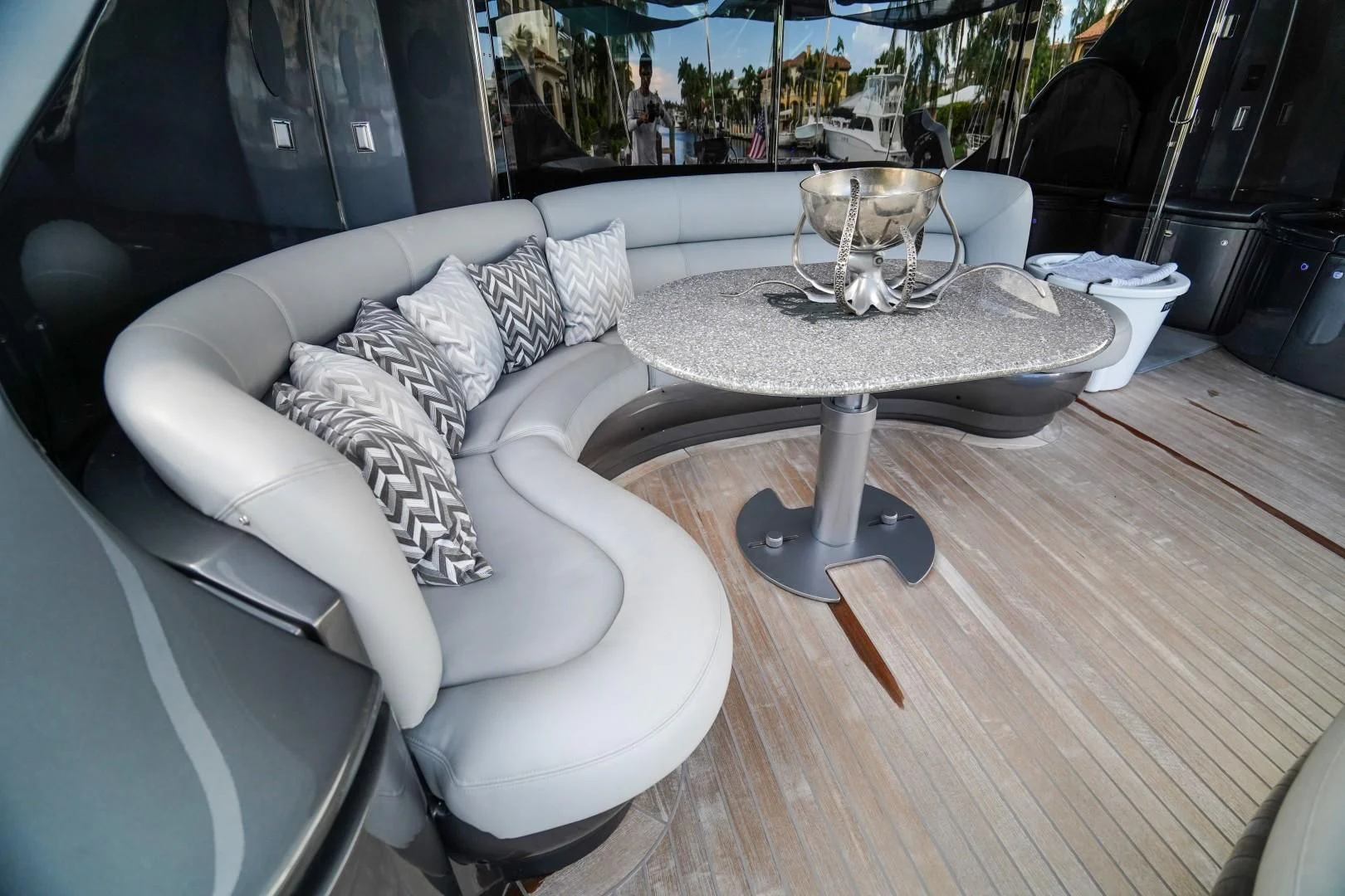 a couch with a coffee table aboard AMORA Yacht for Sale