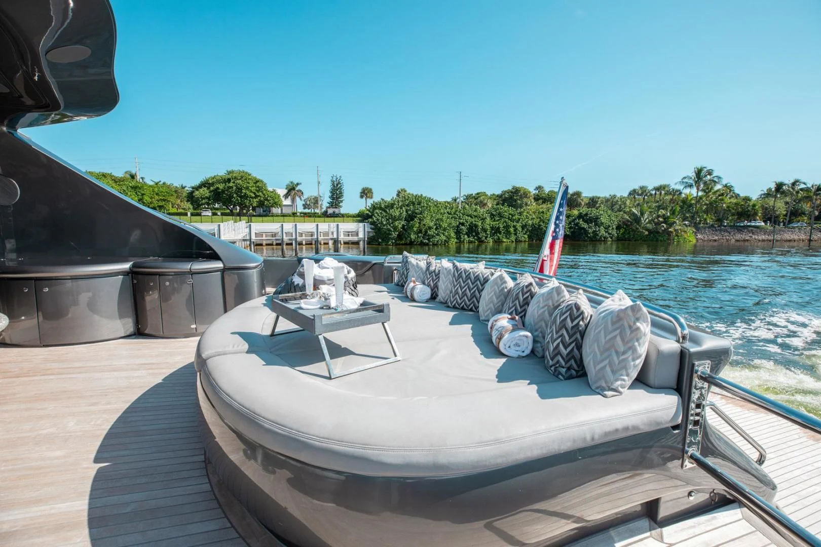 a boat with a flag on it aboard AMORA Yacht for Sale