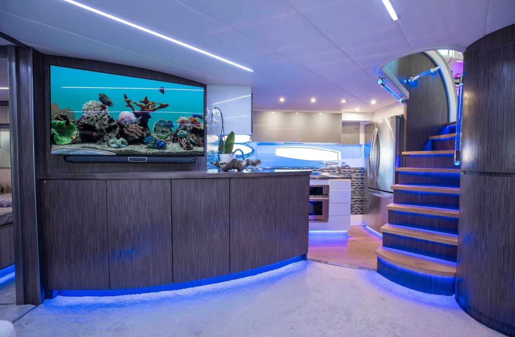 a large room with a large aquarium aboard AMORA Yacht for Sale