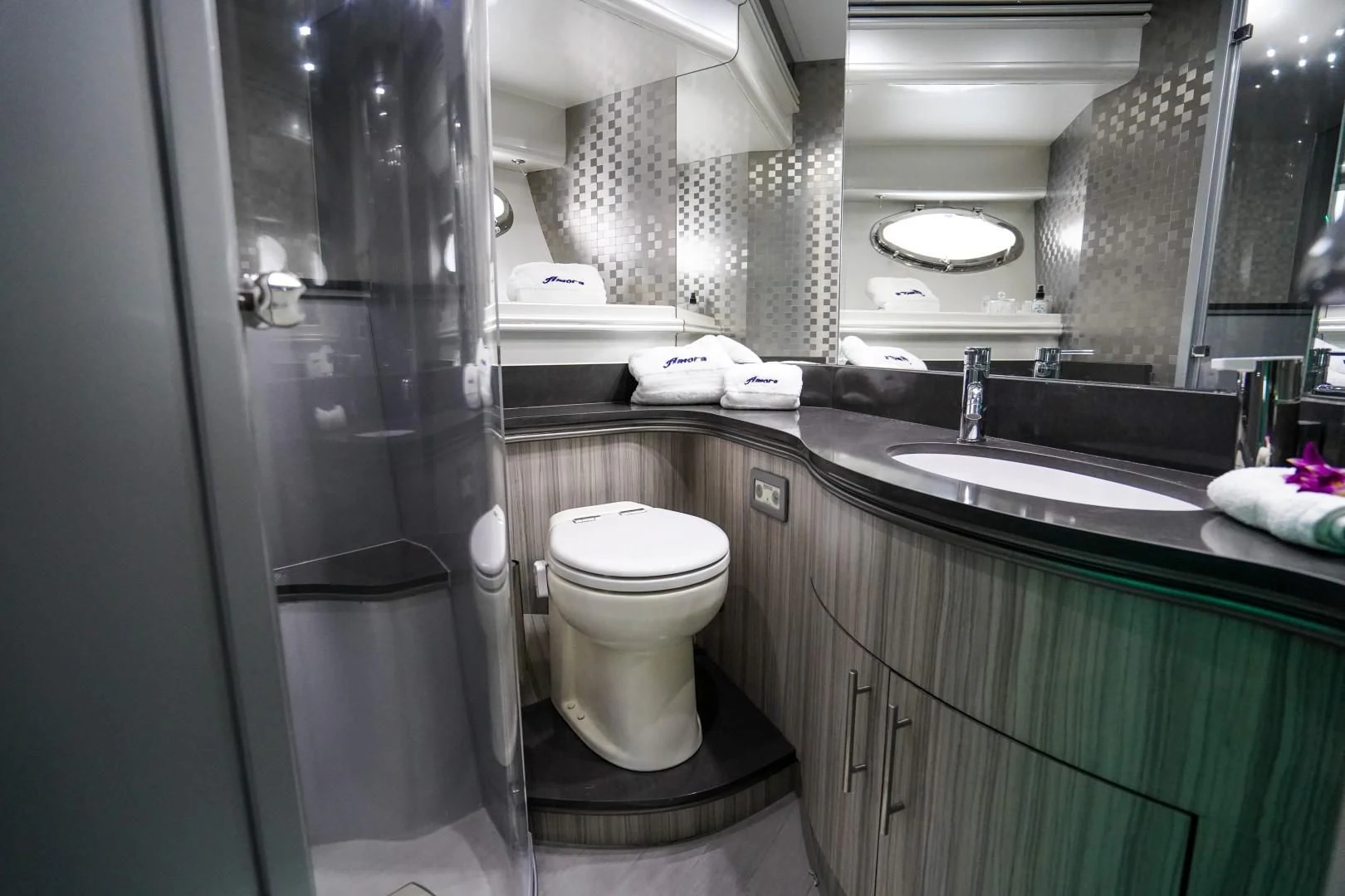 a bathroom with a sink and a toilet aboard AMORA Yacht for Sale